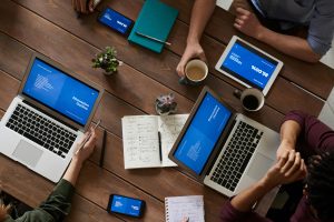 Meeting on table with powerpoints